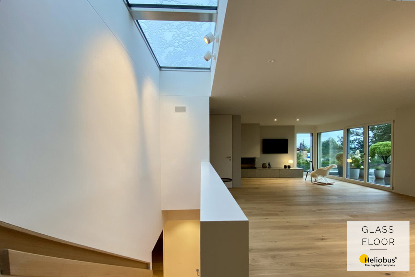 Interior view of a modern apartment with a skylight solution from GLASSFLOOR Heliobus